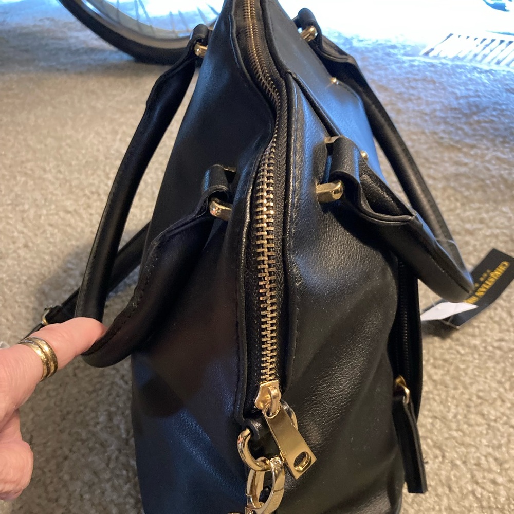 Black handbag with crossbody handles and hand straps. - Picture 4 of 5